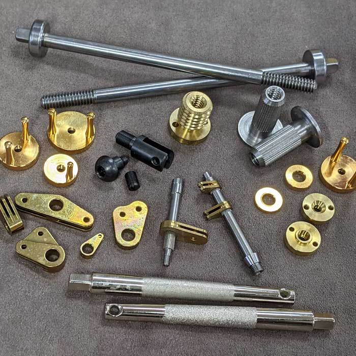 Merit Screw components for musical instruments industry